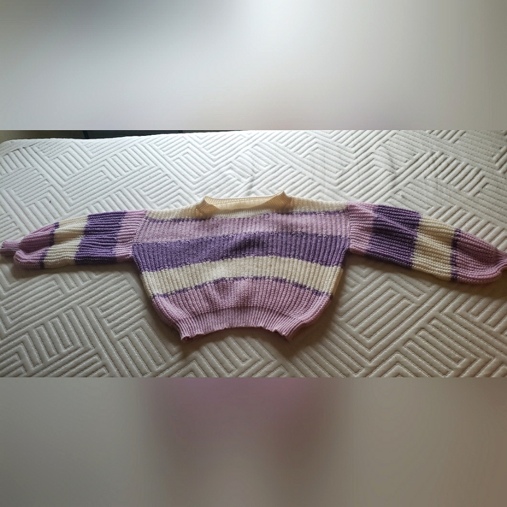 Sweater with purple and white stripes